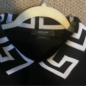 Black Versace short sleeved polo with all Greca key collar and Medusa chest logo